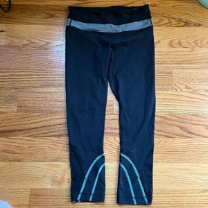 Lululemon black with teal accents crop leggings size 4